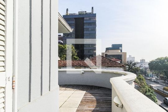 Sacada sala 2 de casa à venda com 4 quartos, 536m² em Rio Branco, Porto Alegre