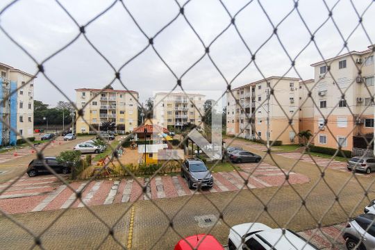 Vista do quarto 1 de apartamento para alugar com 3 quartos, 67m² em Humaitá, Porto Alegre