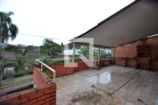 Varanda gourmet de casa à venda com 3 quartos, 156m² em Cascata, Porto Alegre