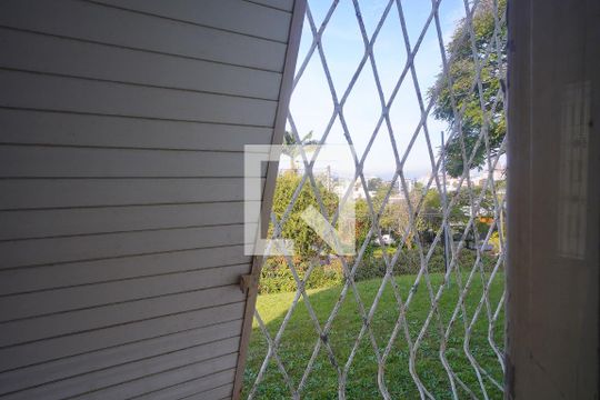 Sala - Vista de casa para alugar com 5 quartos, 370m² em Três Figueiras, Porto Alegre