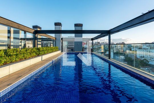 Área comum - Piscina de apartamento à venda com 2 quartos, 65m² em Auxiliadora, Porto Alegre