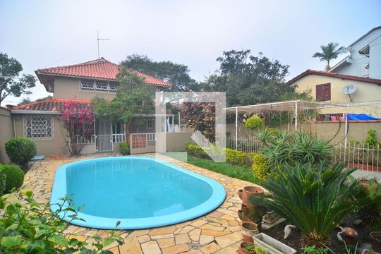 Área Externa de casa à venda com 4 quartos, 153m² em Harmonia, Canoas