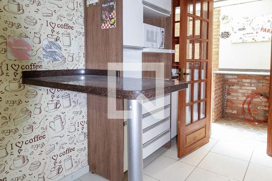 Cozinha de apartamento à venda com 3 quartos, 77m² em Independência, Porto Alegre