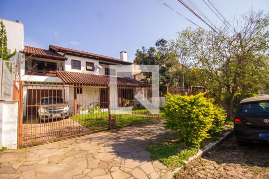 Fachada de casa à venda com 4 quartos, 266m² em Partenon, Porto Alegre