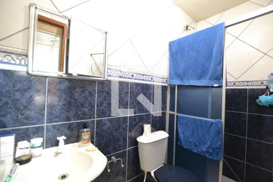 Banheiro da Suíte de casa à venda com 4 quartos, 100m² em Santo Antônio, Porto Alegre