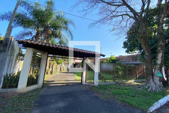 Fachada de casa à venda com 3 quartos, 180m² em Primavera, Novo Hamburgo