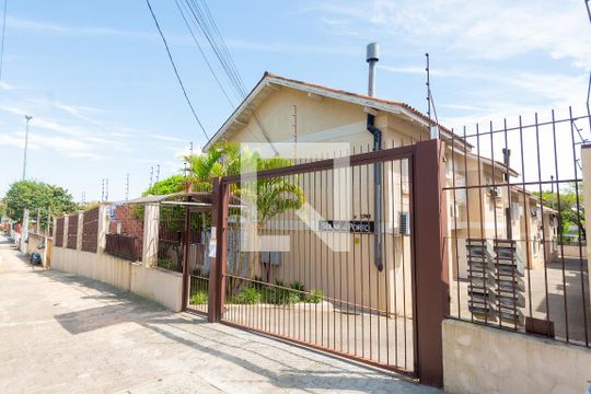 Fachada de casa de condomínio à venda com 3 quartos, 102m² em Vila Conceição, Porto Alegre