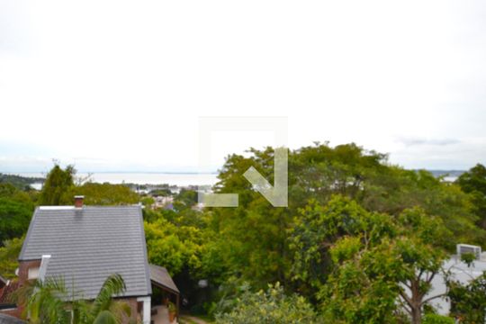 Varanda das Suites 1 e 2 - Com vista para o Guaíba de casa à venda com 5 quartos, 400m² em Vila Assunção, Porto Alegre