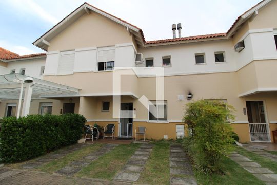 fachada da casa de casa de condomínio para alugar com 3 quartos, 100m² em Estância Velha, Canoas