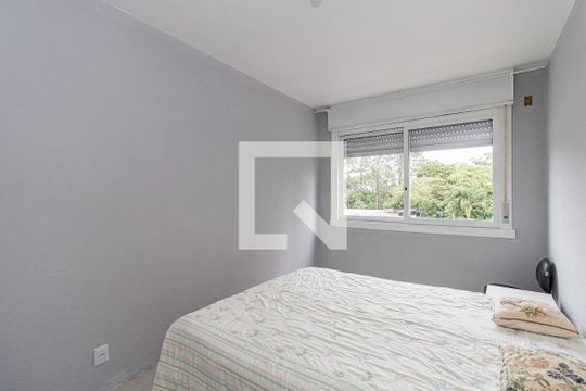 Quarto 1 de apartamento para alugar com 2 quartos, 64m² em Protásio Alves, Porto Alegre