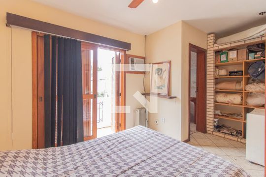 Quarto Suíte - 2 de casa à venda com 3 quartos, 190m² em Espírito Santo, Porto Alegre