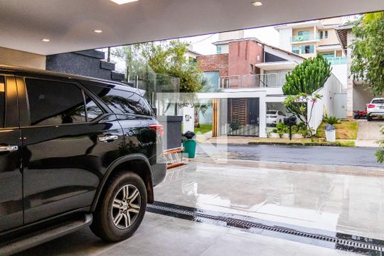 Garagem de casa de condomínio à venda com 6 quartos, 550m² em Paquetá, Belo Horizonte