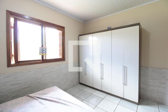 Quarto 1  de casa à venda com 3 quartos, 100m² em Mathias Velho, Canoas