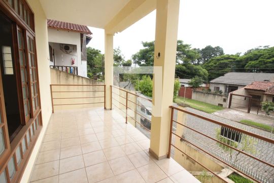 Sacada da Sala 1 de casa à venda com 3 quartos, 345m² em Partenon, Porto Alegre
