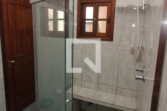 Banheiro da Suíte 1 de casa à venda com 3 quartos, 345m² em Partenon, Porto Alegre