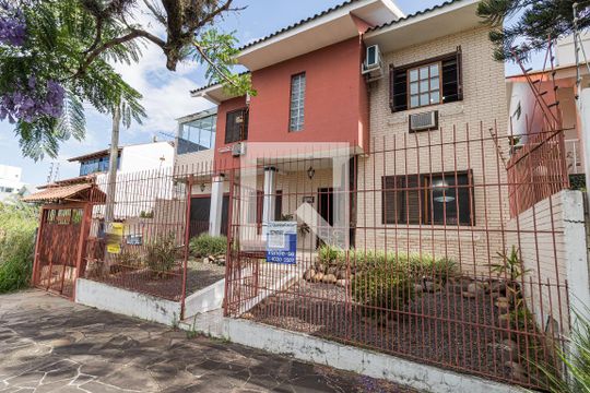 Fachada de casa à venda com 4 quartos, 380m² em Jardim Itu Sabará, Porto Alegre