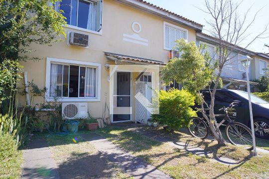 Fachada da Casa de casa de condomínio à venda com 3 quartos, 90m² em Sarandi, Porto Alegre