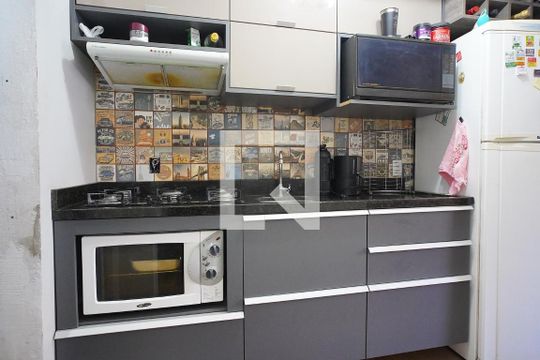 Cozinha de casa de condomínio à venda com 3 quartos, 90m² em Sarandi, Porto Alegre