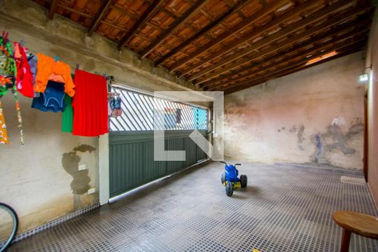 Garagem de casa à venda com 3 quartos, 128m² em Parque São Vicente, Santo André