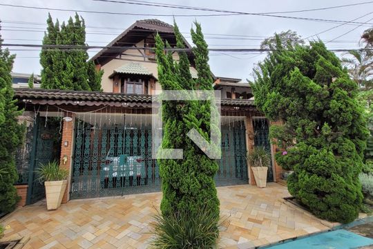 Fachada de casa à venda com 5 quartos, 289m² em Parque Monte Alegre, Taboão da Serra