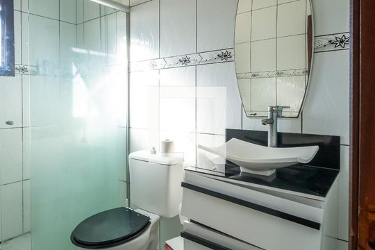 Banheiro da Suíte de casa à venda com 4 quartos, 142m² em Hípica, Porto Alegre