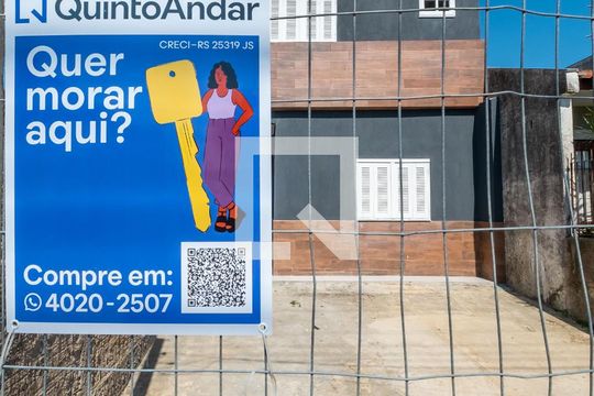 Fachada de casa à venda com 3 quartos, 110m² em Campo Novo, Porto Alegre