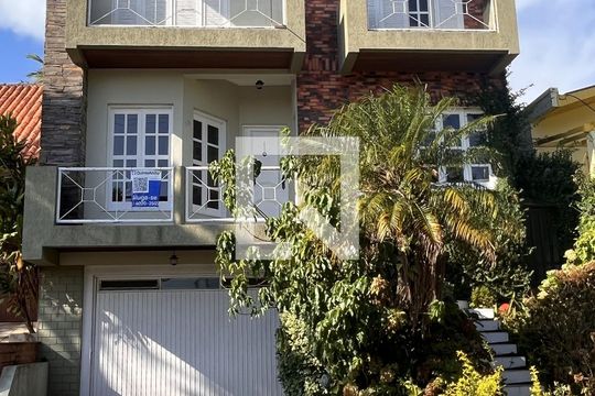 Fachada de casa de condomínio à venda com 4 quartos, 300m² em Espírito Santo, Porto Alegre