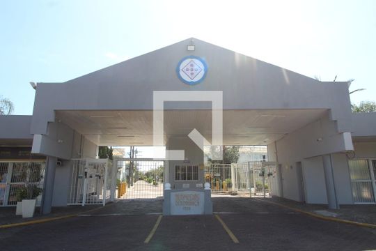 Fachada de casa de condomínio à venda com 3 quartos, 102m² em Rio Branco, Canoas