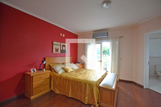 Suíte Master de casa à venda com 4 quartos, 330m² em Santo Antônio, Porto Alegre