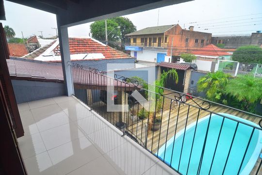 varanda de casa à venda com 3 quartos, 264m² em Rio Branco, Canoas