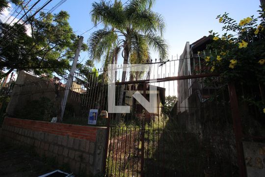 Fachada de casa à venda com 3 quartos, 310m² em Jardim Itu, Porto Alegre
