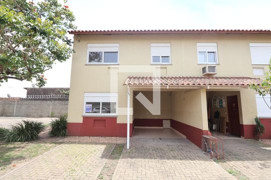 Fachada da Casa de casa de condomínio à venda com 3 quartos, 110m² em Harmonia, Canoas