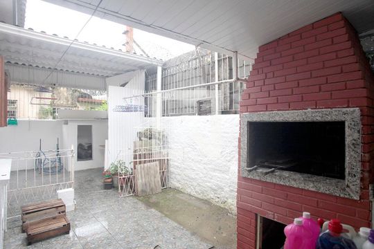 Área de Serviço / Pátio com Churrasqueira de casa à venda com 3 quartos, 134m² em São Geraldo, Porto Alegre