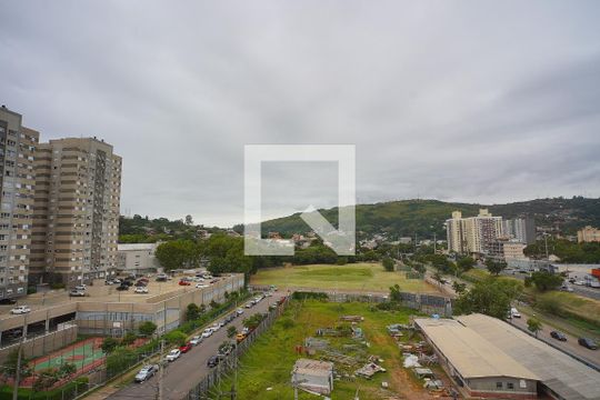 Sala - Vista de kitnet/studio para alugar com 1 quarto, 38m² em Jardim Botânico, Porto Alegre