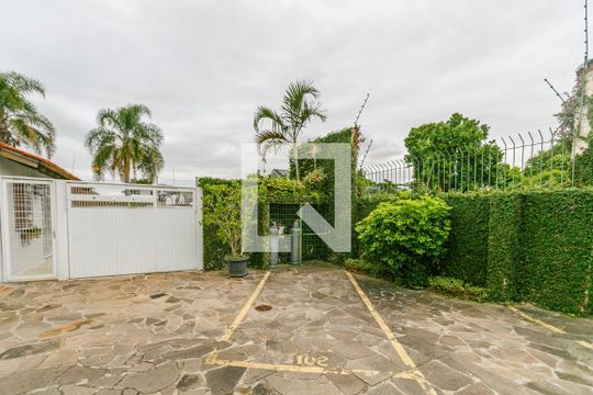 Garagem de casa de condomínio à venda com 4 quartos, 344m² em Ipanema, Porto Alegre