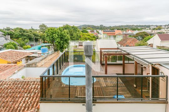 Vista de casa de condomínio à venda com 4 quartos, 344m² em Ipanema, Porto Alegre