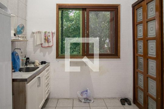 Cozinha 2 de casa à venda com 4 quartos, 260m² em Espírito Santo, Porto Alegre