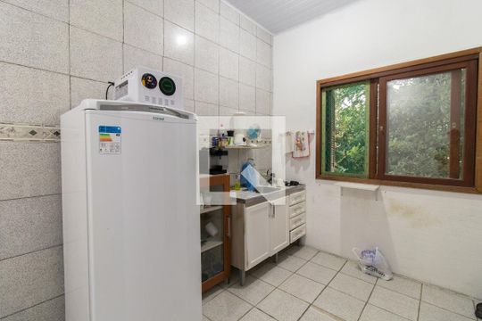 Cozinha 2 de casa à venda com 4 quartos, 260m² em Espírito Santo, Porto Alegre