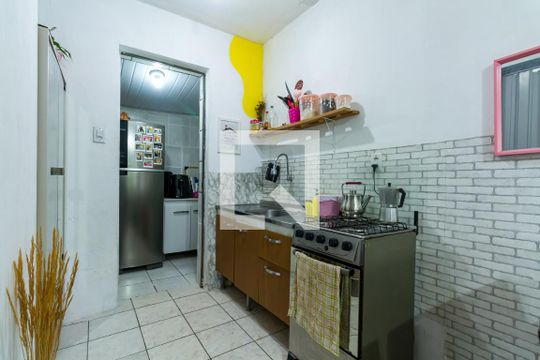 Cozinha de casa de condomínio à venda com 1 quarto, 67m² em Vila Nova, Porto Alegre