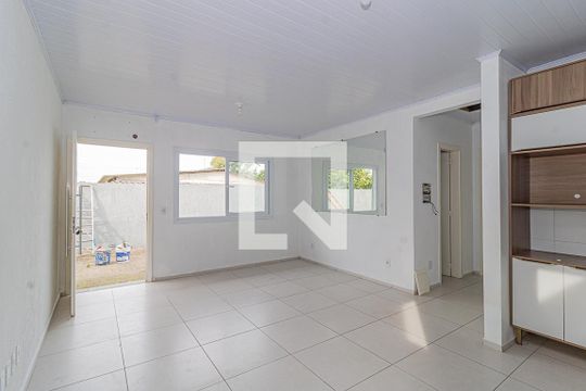 Sala de casa de condomínio à venda com 2 quartos, 56m² em Niterói, Canoas