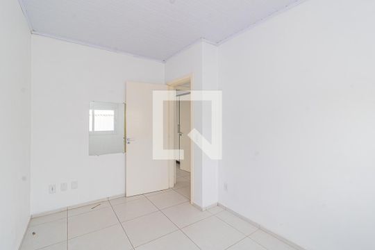 Quarto 1 de casa de condomínio à venda com 2 quartos, 56m² em Niterói, Canoas