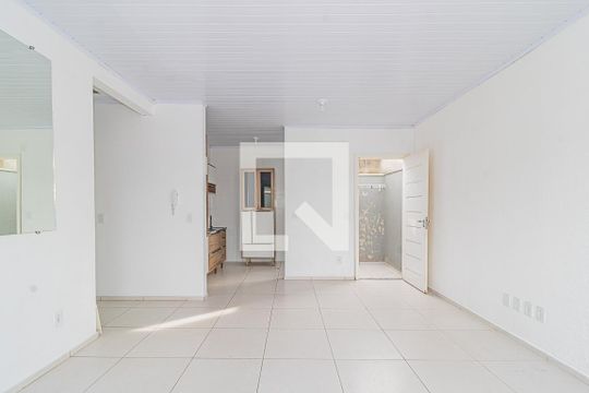 Sala de casa de condomínio à venda com 2 quartos, 56m² em Niterói, Canoas