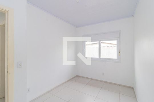 Quarto 1 de casa de condomínio à venda com 2 quartos, 56m² em Niterói, Canoas