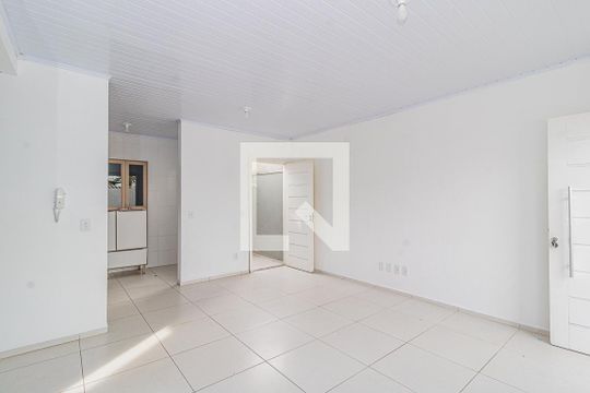 Sala de casa de condomínio à venda com 2 quartos, 56m² em Niterói, Canoas