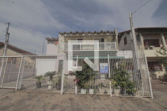 Fachada de casa à venda com 3 quartos, 300m² em Passo das Pedras, Porto Alegre