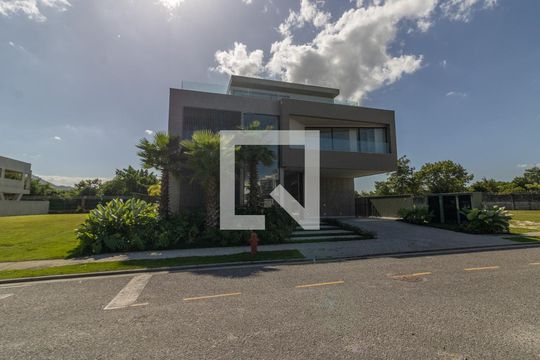 Fachada de casa de condomínio à venda com 4 quartos, 1200m² em Barra da Tijuca, Rio de Janeiro