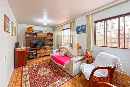 Sala Dois Ambientes de casa à venda com 3 quartos, 330m² em Partenon, Porto Alegre