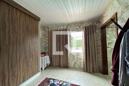 Suíte 1 de casa à venda com 3 quartos, 280m² em Niterói, Canoas