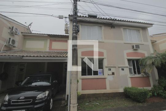 Fachada da casa de casa de condomínio à venda com 4 quartos, 107m² em Humaitá, Porto Alegre