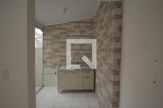 Cozinha de casa de condomínio à venda com 4 quartos, 107m² em Humaitá, Porto Alegre